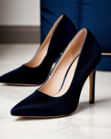 the high heeled pumps are made from blue velvet